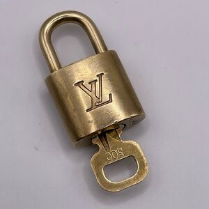 100% Authentic and pre loved Louis Vuitton - Gold Lock and Key set #300
